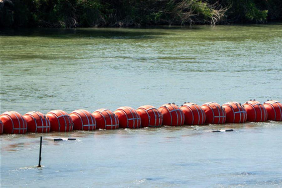 Texas allowed to keep floating barriers on border river to deter immigrants